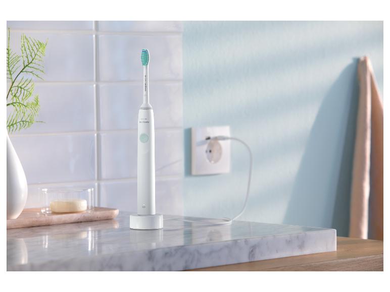 Brosse à dents électrique Philips Sonicare sur son socle de chargement.