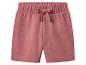 Shorts de sport roses pour enfants avec taille élastique et cordon de serrage.