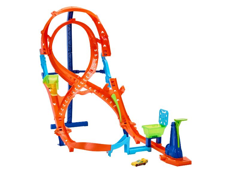 Ensemble de piste Hot Wheels orange et bleu avec boucles, rampes et une voiture jaune
