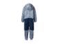 Combinaison enfant bleue avec imprimé nuages et gouttes de pluie, bas bleu foncé et détails réfléchissants.