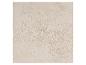 Gros plan d'un mur ou d'une surface texturée beige, offrant un fond tactile.