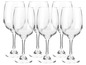 Six verres à vin blanc vides.