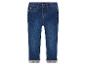 Un jean bleu pour filles avec un imprimé d'ours.