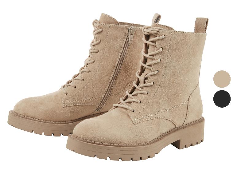 Bottines beiges à lacets et semelle épaisse.