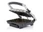 Grill ouvert montrant la plaque chauffante.