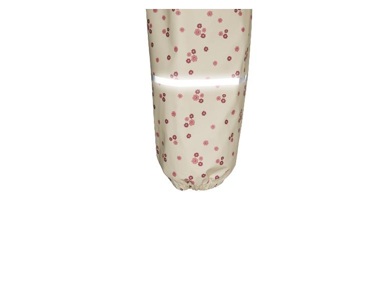 Pantalon de pluie à imprimé floral avec détails réfléchissants.