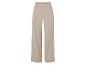 Pantalon large beige avec taille élastique.