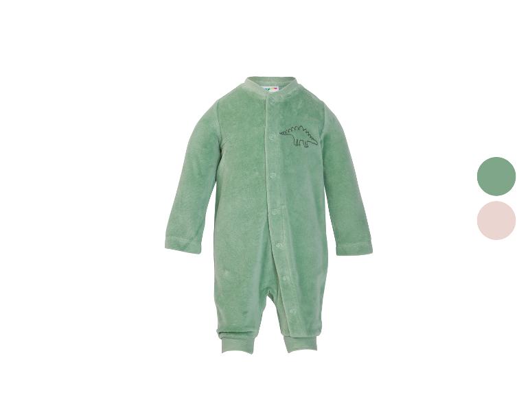 Grenouillère bébé en velours vert avec broderie dinosaure.