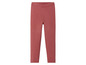 Un legging rose en maille.