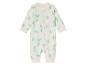 Une grenouillère blanche pour bébé avec un motif de dinosaures verts.