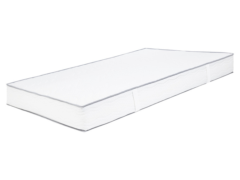 Un matelas blanc avec une bordure grise.