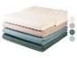 Draps-housses jersey en plusieurs coloris pastel.