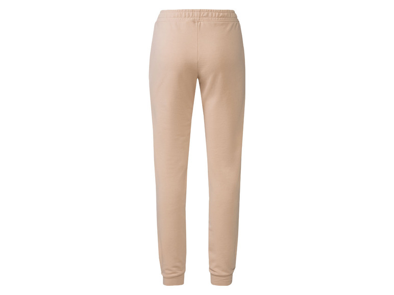 Pantalon de survêtement beige pour femme.
