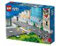 LEGO City : jeu de construction avec feux de signalisation, panneaux et plaques de route, éléments lumineux.