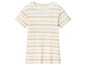 T-shirt blanc à rayures beiges.