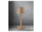 Un lampadaire beige avec un abat-jour rond sur un fond gris.