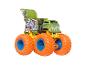 Camion monstre Hot Wheels vert avec pneus orange et jantes bleues.