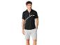 Polo à zip et shorts gris pour homme.