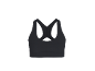 Soutien-gorge de sport noir avec bretelles croisées dans le dos.