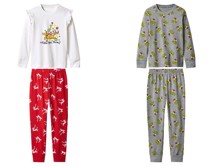 Deux pyjamas de Noël pour enfants avec des thèmes Grinch et rennes.