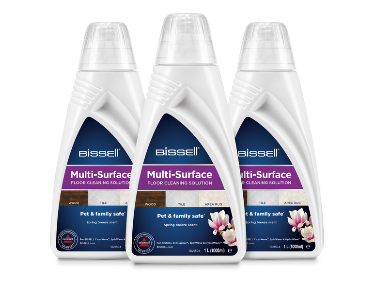 Trois bouteilles de solution nettoyante pour sols Bissell Multi-Surface pour le bois, les carreaux et les tapis.