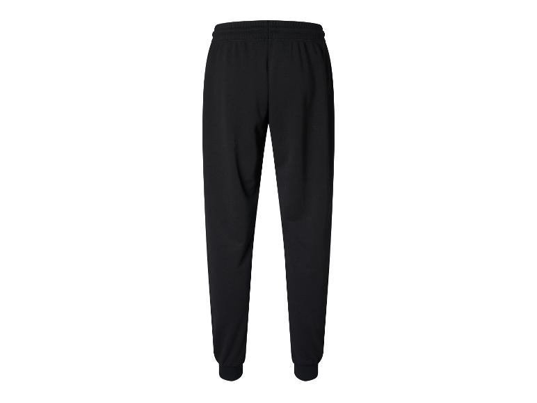 Pantalon de survêtement noir pour homme avec taille et chevilles élastiques.
