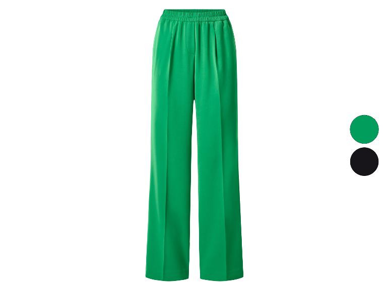 Pantalon large vert avec taille élastique, également disponible en noir.