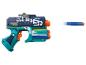 Pistolet jouet bleu et vert avec fléchettes en mousse, avec le texte 'MODEL SUPER RAPID FIRE'.