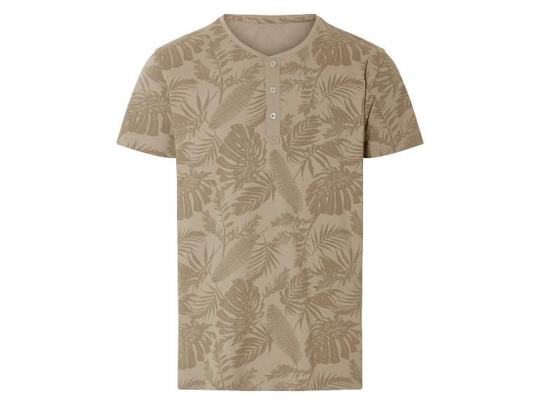 T-shirt beige homme avec imprimé feuilles tropicales.