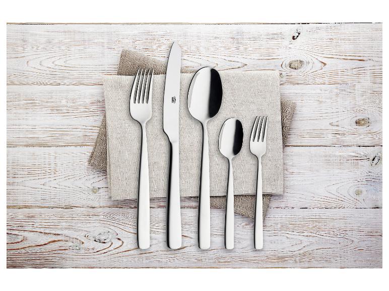 Service de couverts GSW Besteck-Set Premium sur nappe en lin et table en bois blanc