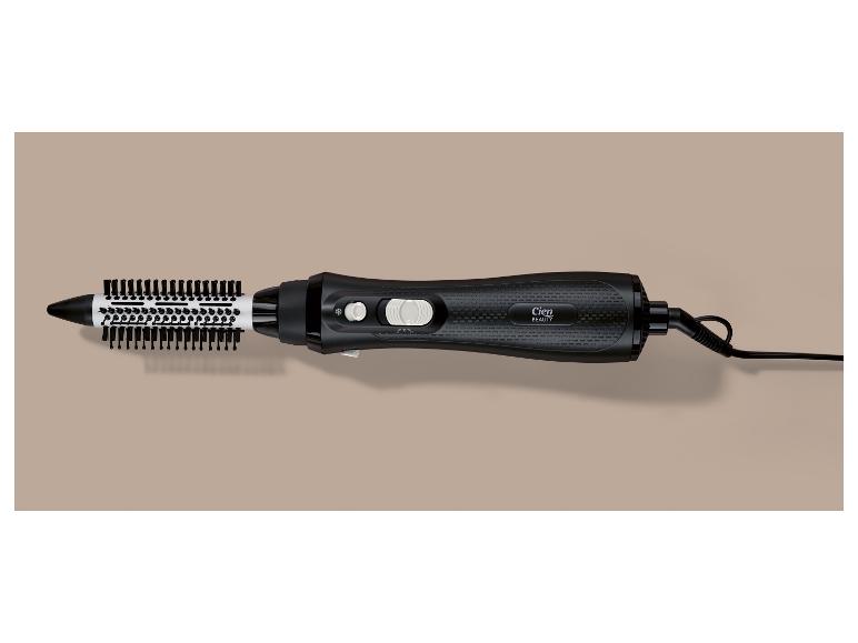 Brosse soufflante noire avec poils blancs et noirs, dotée de boutons de contrôle.