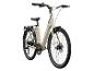 Un vélo électrique beige avec des pneus Schwalbe Big Ben.