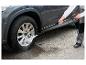 Nettoyage d'une roue de voiture avec un nettoyeur haute pression