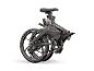 Vélo électrique pliant gris, plié pour le rangement