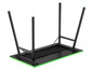 Une table de jeu noire avec des accents verts et un filet sous le plateau.
