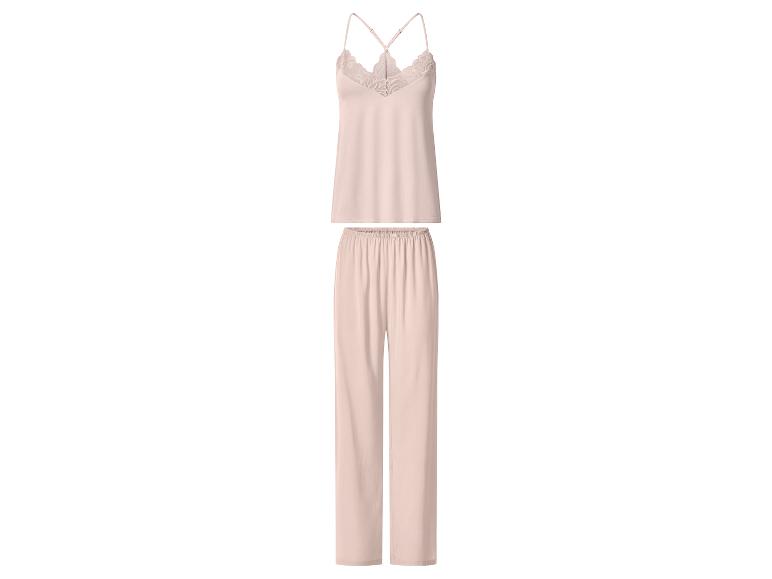 Pyjama deux pièces rose clair pour femme avec débardeur à bretelles et pantalon long.
