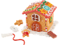 Jouet en bois en forme de maison en pain d'épices de Noël avec figurines.