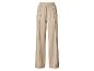 Pantalon large beige avec taille élastique.