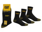 Trois paires de chaussettes de travail CAT noires avec des accents jaunes.