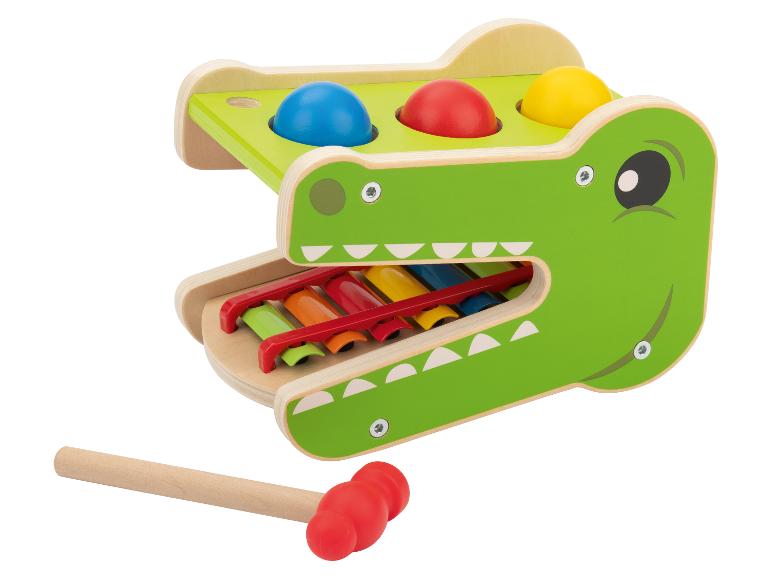 Banc à marteler crocodile avec balles colorées et xylophone.