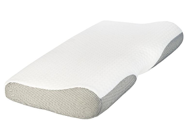 Oreiller ergonomique en mousse à mémoire de forme avec housse en mesh.
