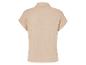 Chemise beige à manches courtes en tissu mousseline.