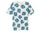 Un t-shirt blanc imprimé de dinosaures bleus.