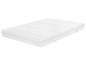 Un matelas blanc avec une texture ondulée.