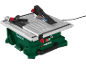 Scie de table électrique verte et grise avec lame circulaire et accessoires.