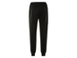 Pantalon de survêtement noir avec ceinture élastique.