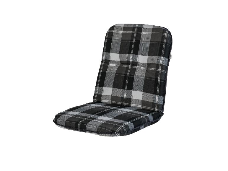 Un coussin de siège de chaise à carreaux noir et blanc.