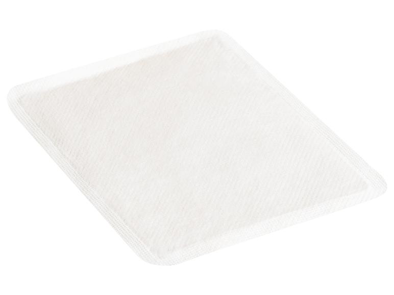 Un coussin chauffant blanc carré.