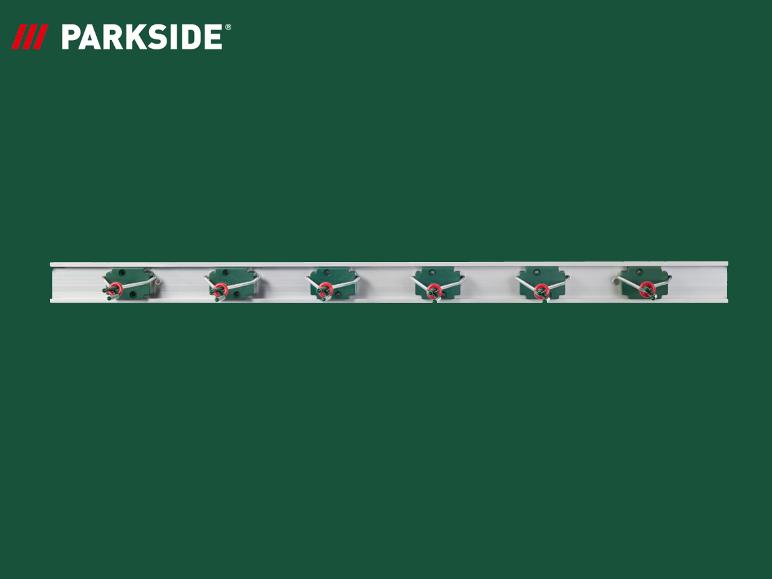 Support mural pour outils PARKSIDE® avec clips métalliques.