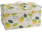 Sac isotherme avec motif de feuilles dans les tons vert, jaune et blanc